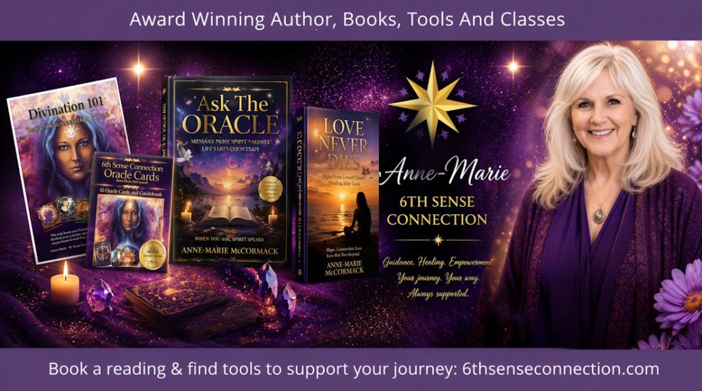 Anne-Marie author and psychic medium holding her published books and oracle cards, showcasing her spiritual work